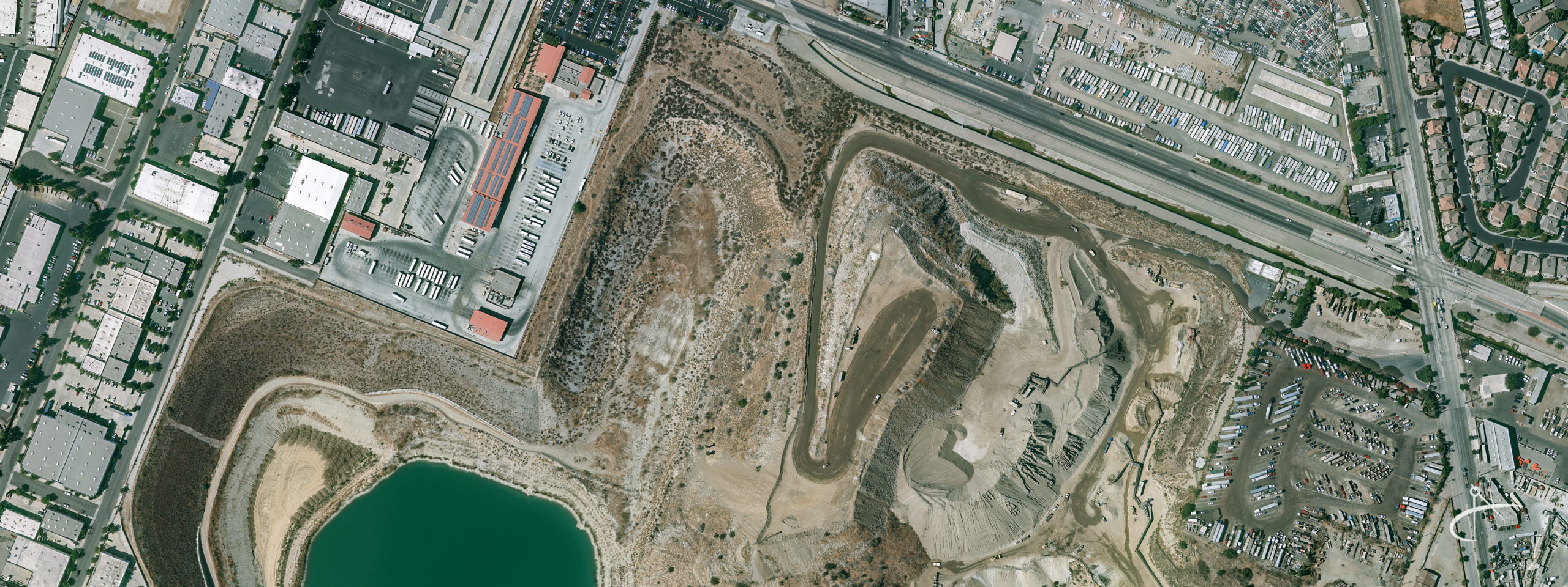 Gravel mine pit and industrial area.