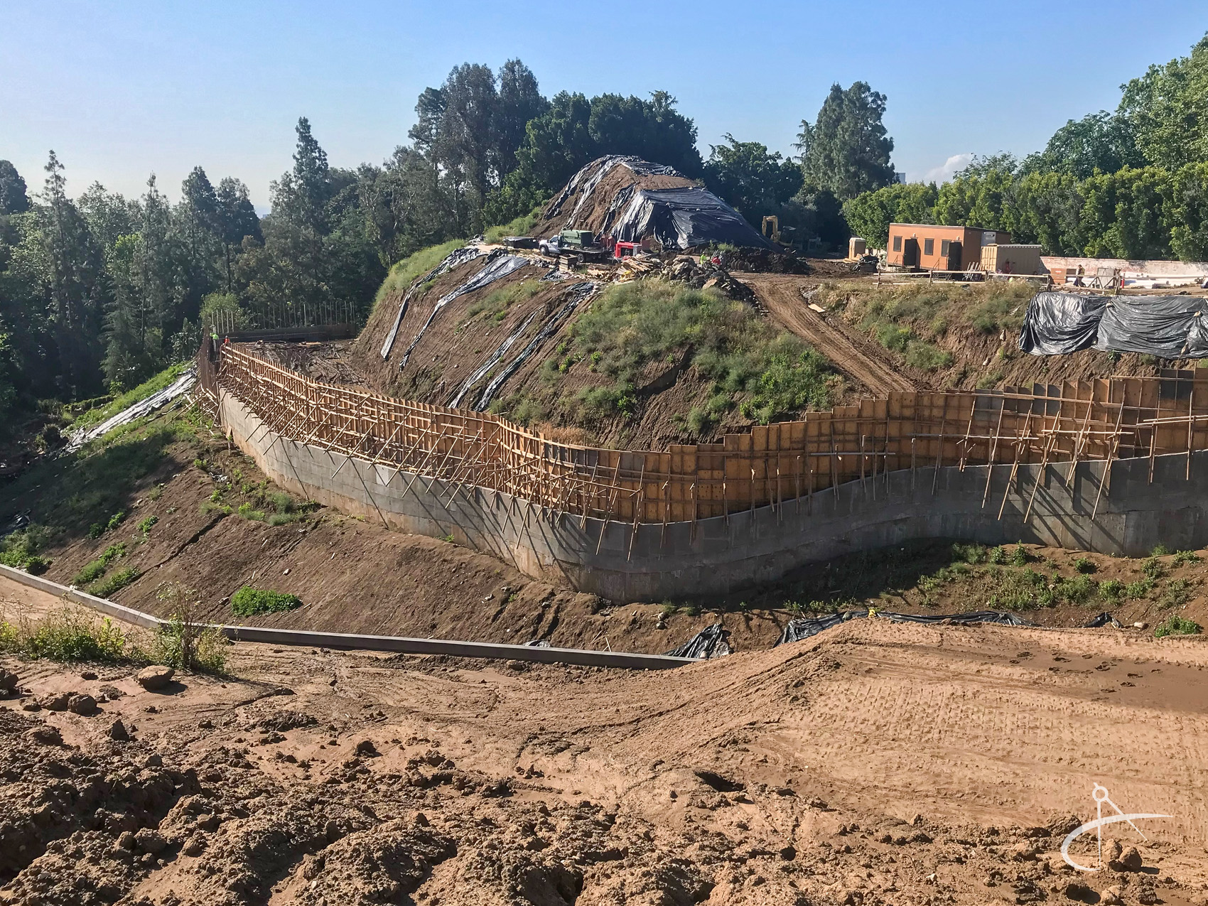 Large retaining wall under construction.